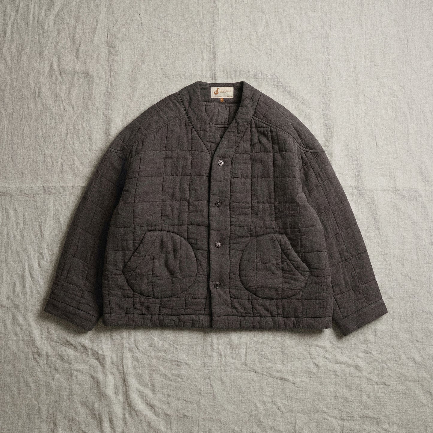nook quilted jacket in dark